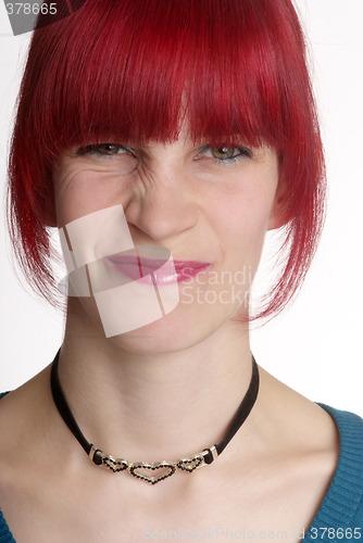 Image of woman turns nose