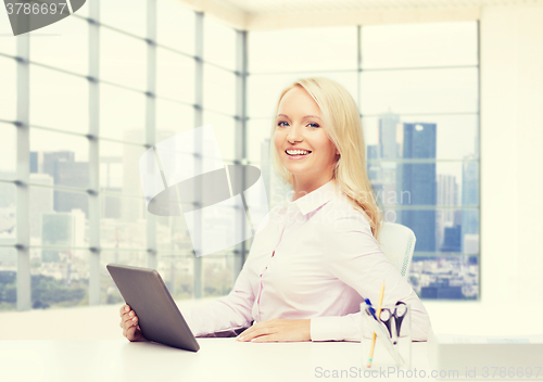 Image of smiling businesswoman or student with tablet pc