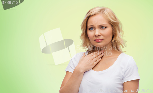 Image of unhappy woman suffering from throat pain