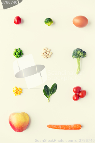 Image of close up of ripe vegetables and food over white