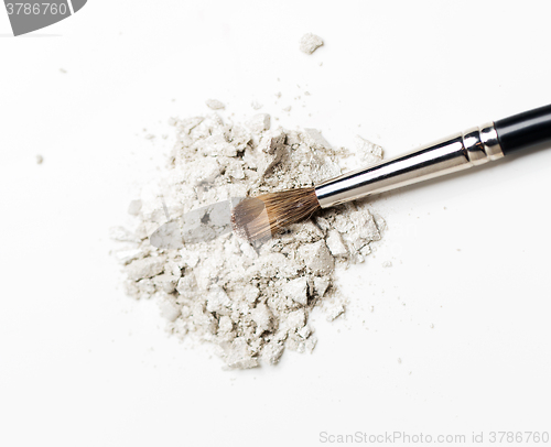 Image of close up of makeup brush and eyeshadow