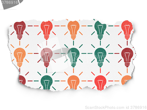 Image of Business concept: Light Bulb icons on Torn Paper background