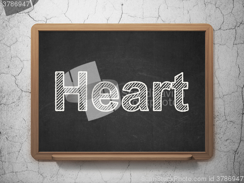 Image of Healthcare concept: Heart on chalkboard background