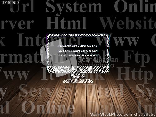 Image of Web development concept: Monitor in grunge dark room