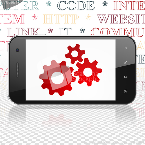 Image of Web development concept: Smartphone with Gears on display