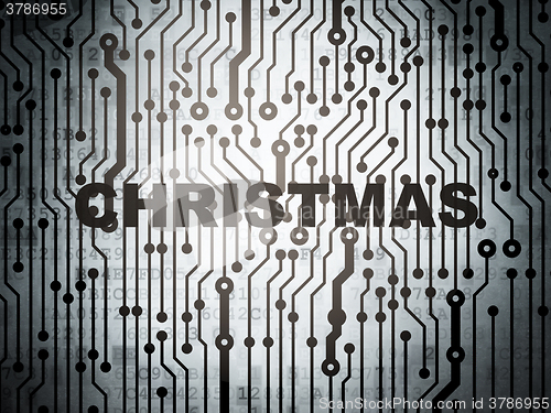 Image of Holiday concept: circuit board with Christmas