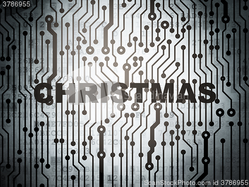 Image of Holiday concept: circuit board with Christmas