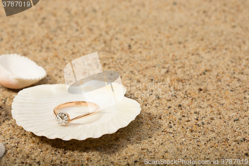 Image of Wedding ring in a shell