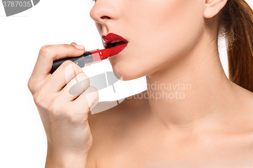 Image of Beautiful female lips with make-up and pomade