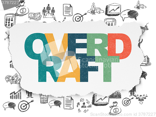 Image of Business concept: Overdraft on Torn Paper background