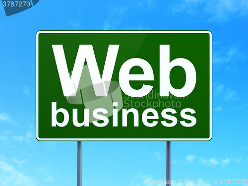 Image of Web development concept: Web Business on road sign background
