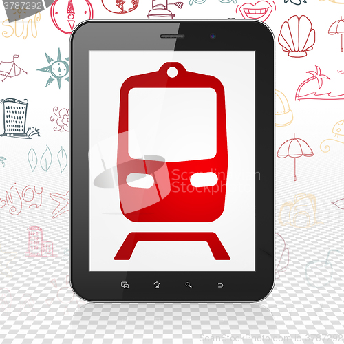 Image of Vacation concept: Tablet Computer with Train on display