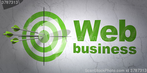 Image of Web design concept: target and Web Business on wall background