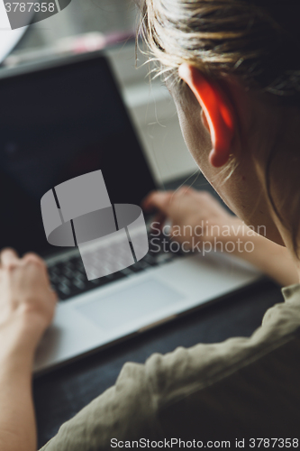 Image of Woman working on the laptop