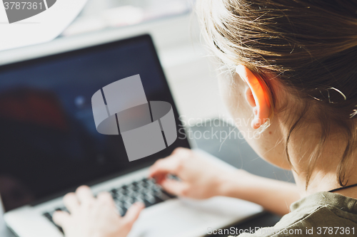 Image of Woman working on the laptop