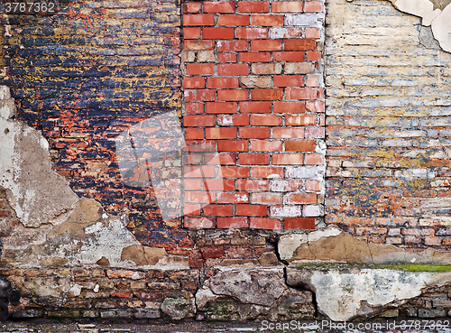 Image of colorful abandoned  brick  wall 