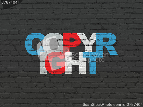 Image of Law concept: Copyright on wall background