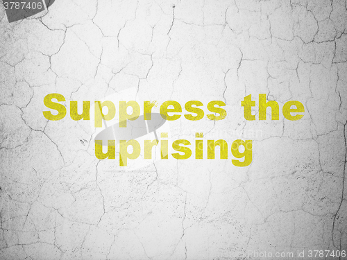 Image of Politics concept: Suppress The Uprising on wall background