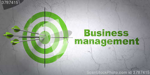 Image of Business concept: target and Business Management on wall background