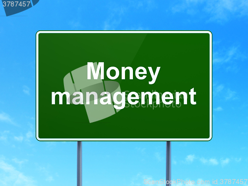 Image of Banking concept: Money Management on road sign background