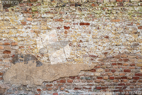 Image of colorful abandoned  brick  wall 