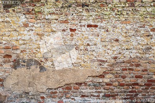 Image of colorful abandoned  brick  wall 