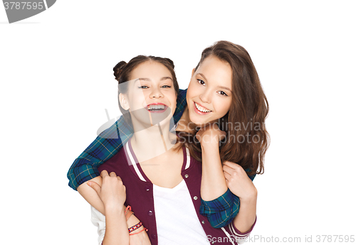 Image of happy smiling pretty teenage girls hugging