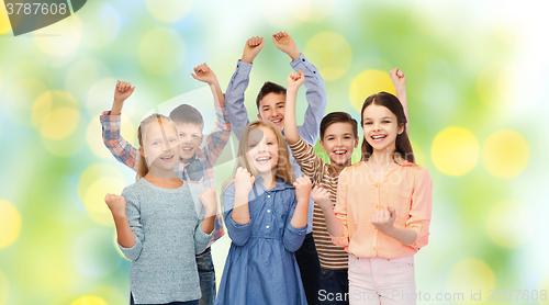 Image of happy children celebrating victory