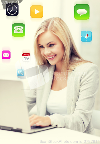 Image of businesswoman with laptop