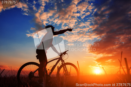 Image of biker in autumn on a sunny afternoon