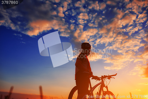 Image of biker in autumn on a sunny afternoon