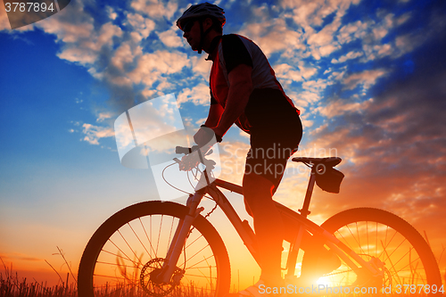 Image of biker in autumn on a sunny afternoon