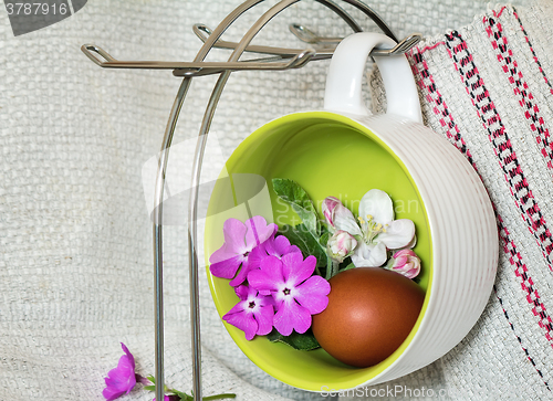 Image of Easter egg, violets and Apple blossoms.