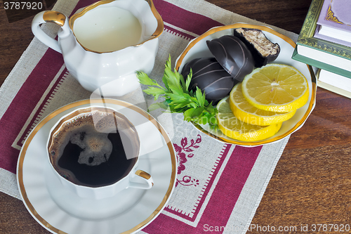 Image of Still life : a Cup of black coffee on the table.