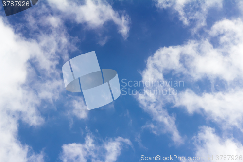 Image of Blue sky and white fluffy clouds.