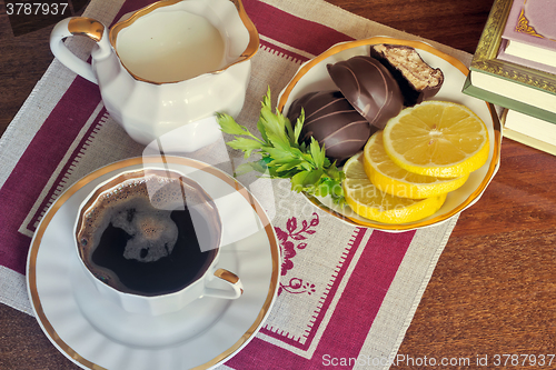 Image of Still life : a Cup of black coffee on the table.