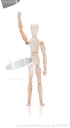 Image of Wooden dummy man waving hello