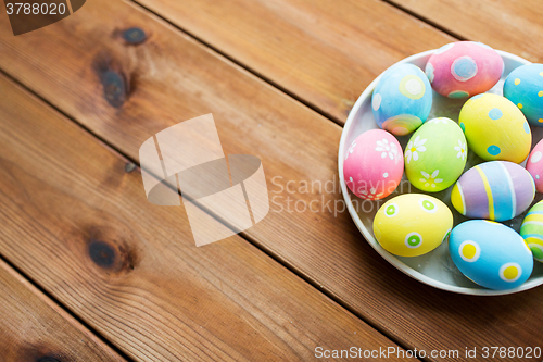 Image of close up of colored easter eggs on plate