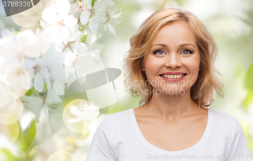 Image of smiling woman in blank white t-shirt