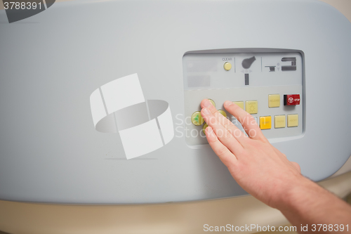 Image of scientist Scanning the brains of patients with a tomography scan