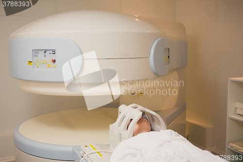 Image of Patient being scanned and diagnosed on a computed tomography