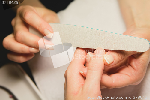 Image of Closeup shot of woman in nail salon 