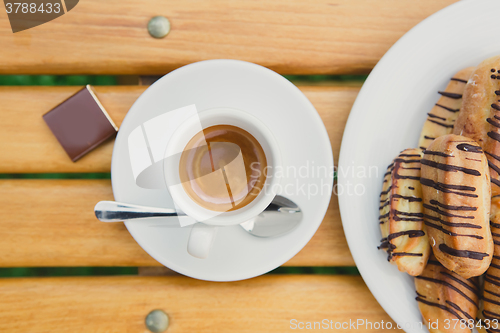 Image of Morning coffee. Cup coffee in park