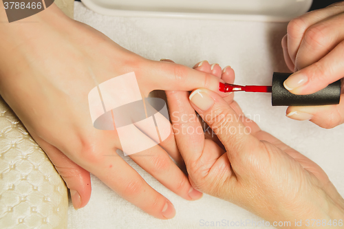 Image of Closeup shot of woman in nail salon 