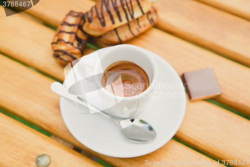 Image of Morning coffee. Cup coffee in park