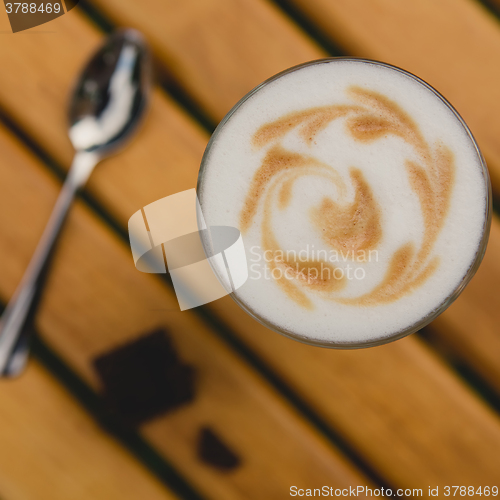 Image of Morning coffee. Cup coffee in park