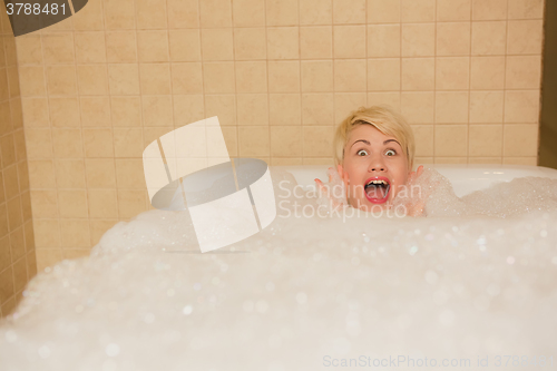 Image of Woman in hydro massage. She receives medical treatments for relaxation.