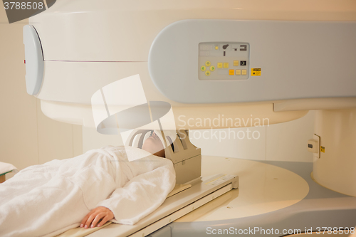 Image of Patient being scanned and diagnosed on a computed tomography