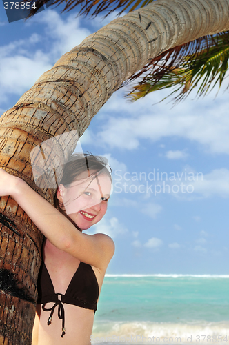 Image of Young girl with seashell