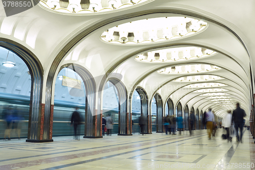 Image of Motion blurred commuters at the metro station.